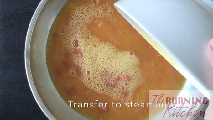 transferring egg mixture into steel plate for steaming