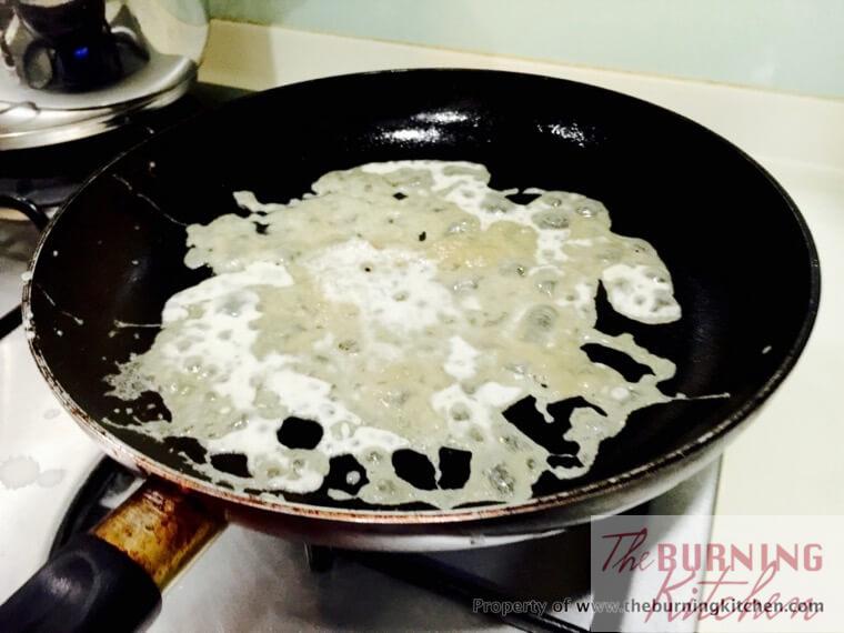 rice flour and potato flour mixture frying on non-stick pan