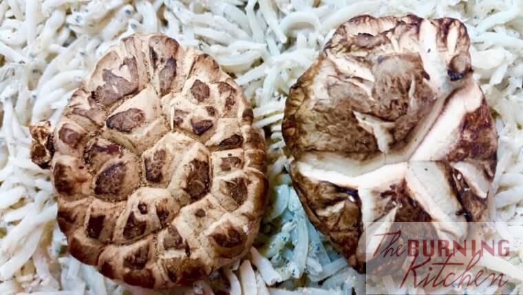 Shitake Mushrooms on uncooked ikan bilis