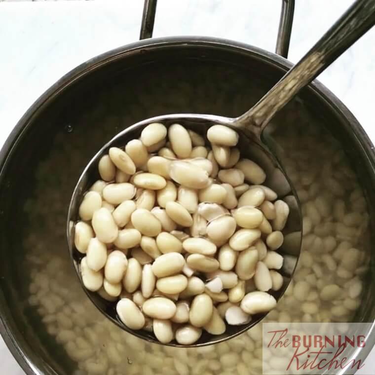 Soaking soy beans in a pot with water