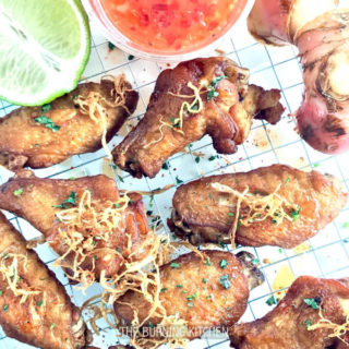 Blue Ginger Fried Chicken Wings: These ultra juicy, flavour-packed chicken wings are marinated overnight in freshly extracted blue ginger juice, then fried to golden perfection. Top with cilantro, chilli flakes and Thai sweet chilli dressing, and serve piping hot!