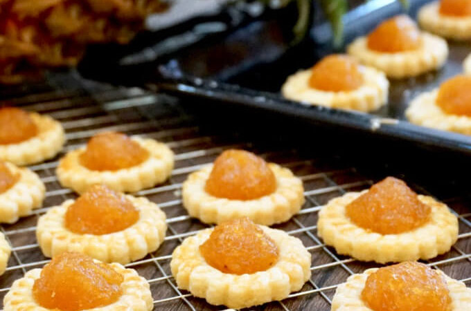 Homemade Pineapple Tarts (凤梨挞 ／ 黄梨挞): These highly addictive pineapple tarts are made from scratch using homemade chunky spiced pineapple jam, which sit atop a tart pastry that is buttery and crumbly. One piece will not be enough!