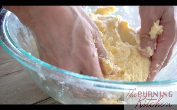 Kneading butter and flour mixture into dough
