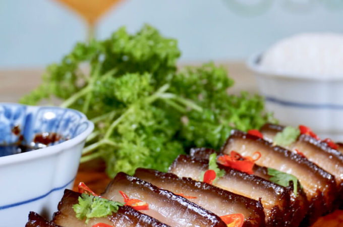 Assam Braised Pork Belly: Tender melt-in-your mouth braised pork belly in a tart and slightly sweet assam (tamarind) sauce. Only needs 15 minutes active time and 3 key ingredients (plus common condiments you already have in your kitchen). An unfussy and simple homestyle dish but tastes oh so good!