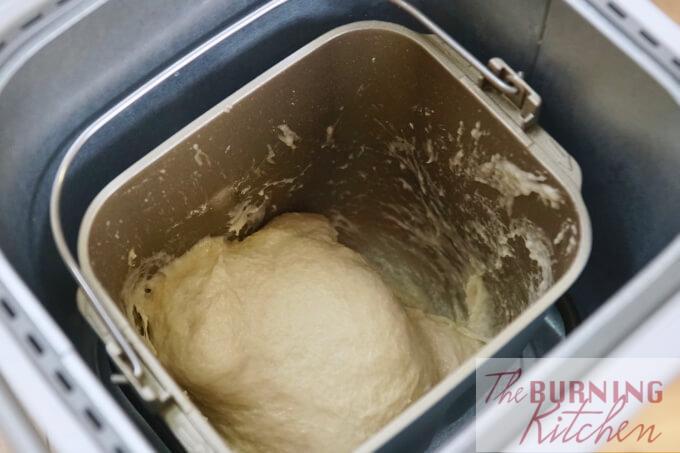 Bread dough being mixed in Panasonic Breadmaker machine